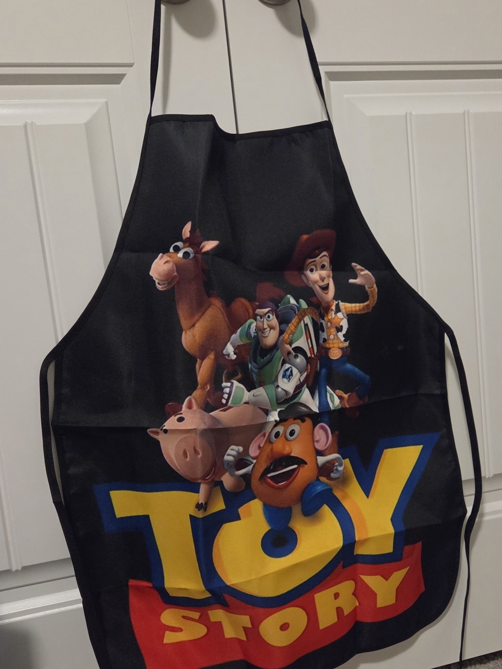 Disney Toy Story Black Character Apron with Multicolor Logo NWOT